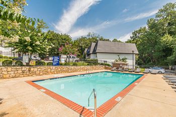 take a dip in the resort style pool at Pines at Lawrenceville Apartments in Decatur, Georgia 30033